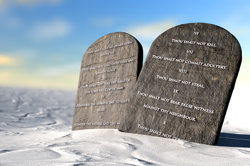 Two stone tablets with the ten commandments inscribed on them