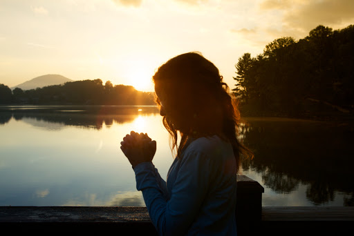 Woman In Prayer