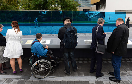 GERMANY, Berlin : Visitors read about the memorial to the victims of the Nazis&rsquo; « euthanasia » programme