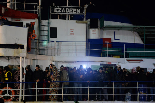 Some 500 Syrian would be immigrants arrive aboard the Ezadeen ship at Corigliano harbour on January 2, 2015