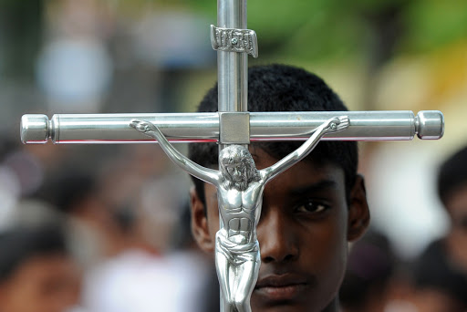 Sri Lankan Christian devotees take part in the annual Way of the Cross ritual