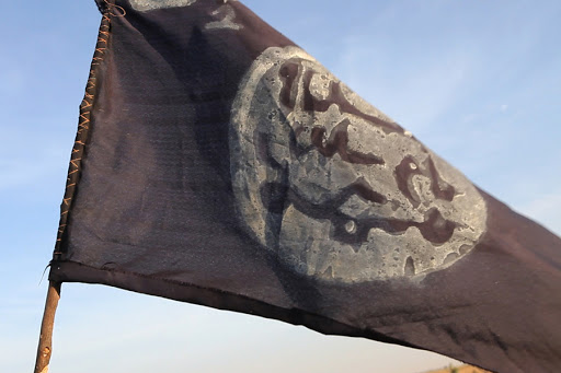 A Boko Haram flag flutters