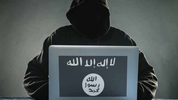 WEB COMPUTER MAN ISIS FLAG © Lukas Gojda Shutterstock