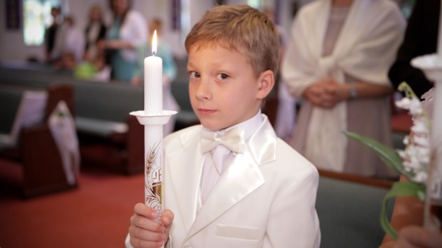web-first-holy-communion-boy-candle-pawel-loj-cc.jpg