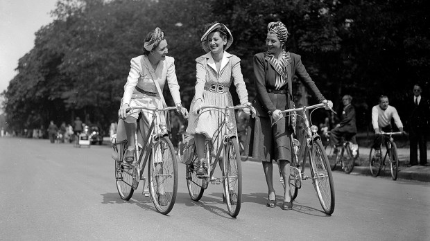 web-girls-bike-skirt-smile-c2a9-lapi-roger-viollet-getty.jpg