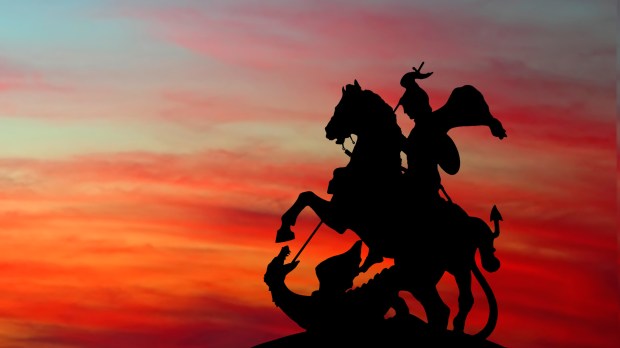 Monument to Saint George and the Dragon on sunset background. The monument is located in the Moscow (Russia). Saint George the Victorious is regarded as one of the most prominent military saints