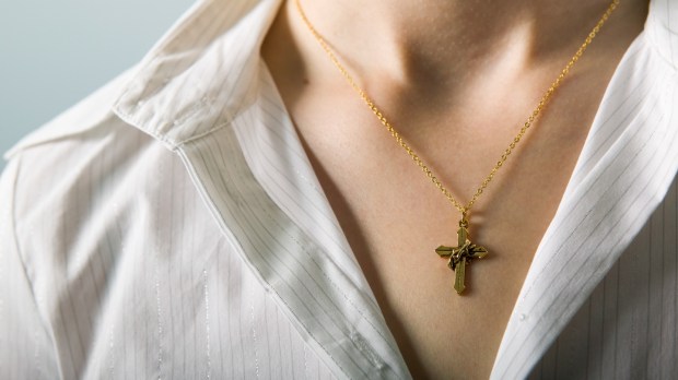Woman wearing cross necklace
