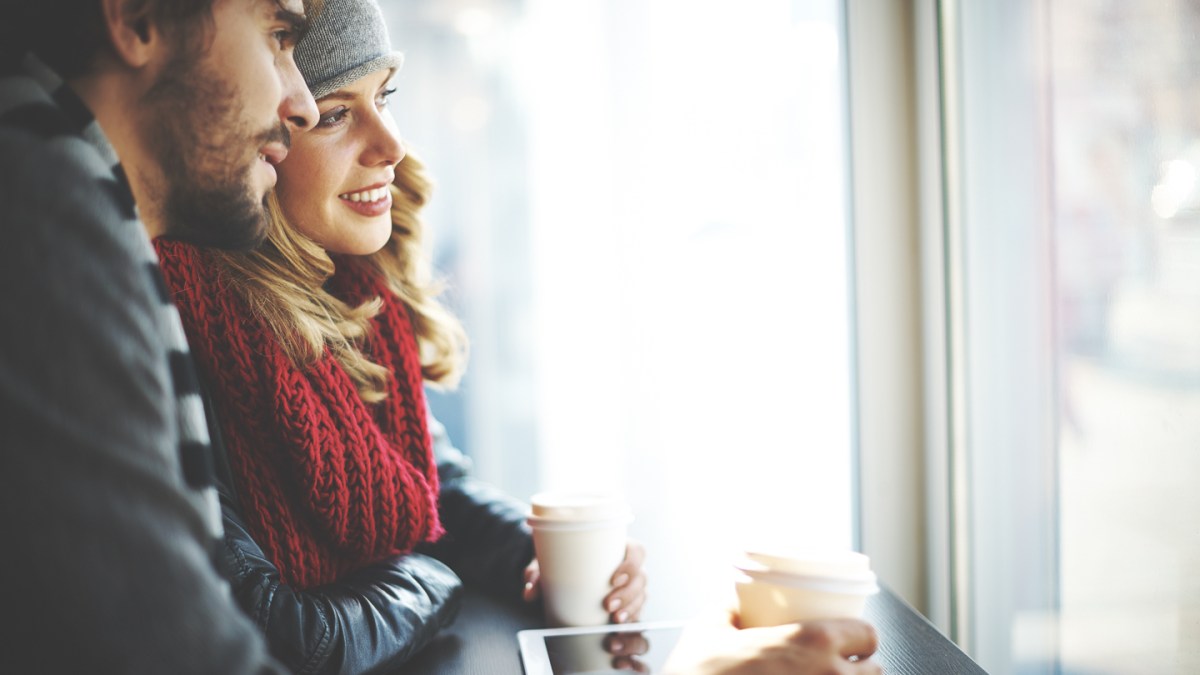 web-couple-coffee-window-smile-pressmaster-shutterstock
