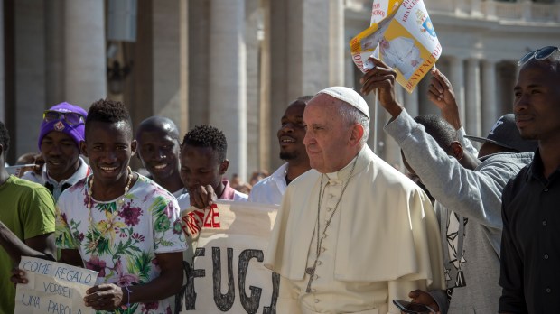 Pope Francis With refugees