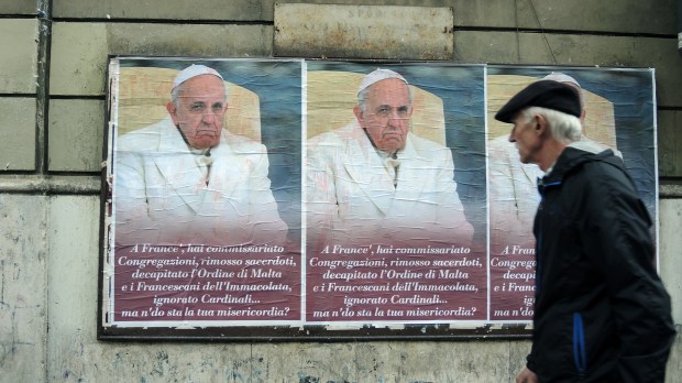 Posters criticizing the pope in Rome