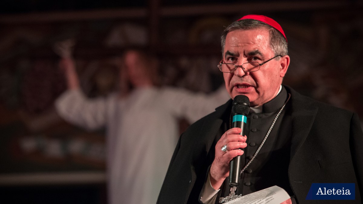 Msgr. Angelo Becciu speaks during the via Crucis for women cruci