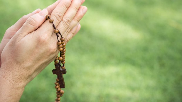 web rosary prayer hands cross © PhilipYb Studio : Shutterstock