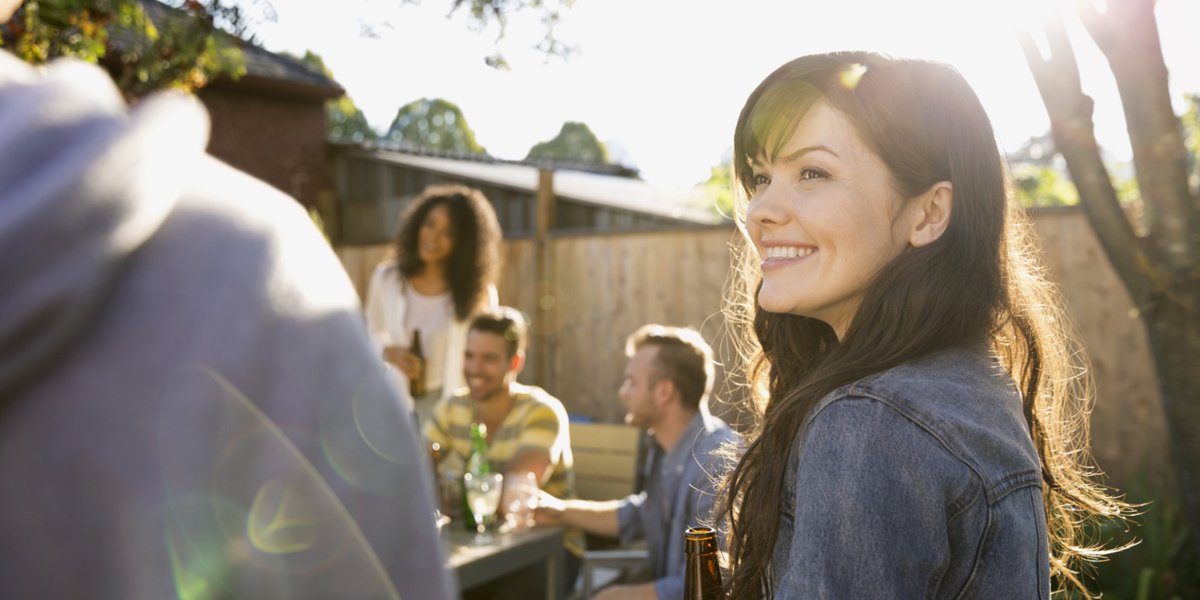 web3-woman-smile-garden-party-beer-gettyimages.jpg