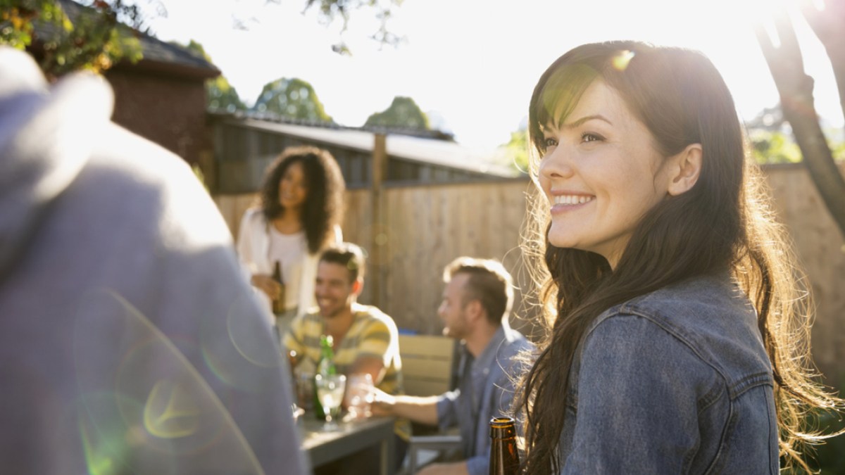 web3-woman-smile-garden-party-beer-gettyimages.jpg