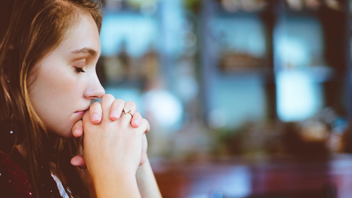 WOMAN PRAYING