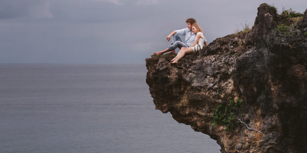 web3-couple-love-cliff-ocean-alexander-grabchilev-stocksy-united