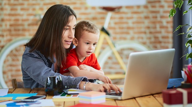 WEB3-MOTHER-SON-CHILD-WORK-COMPUTER-OFFICE-Shutterstock