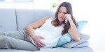 FEMME ENCEINTE QUI PLEURE