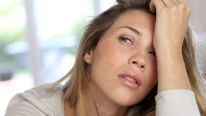 WEB3 BLONDE WOMAN BORED HOME SAD DEPRESSED Shutterstock