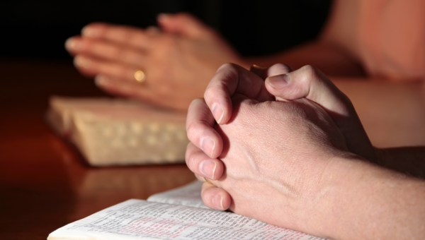 COUPLE PRAYING