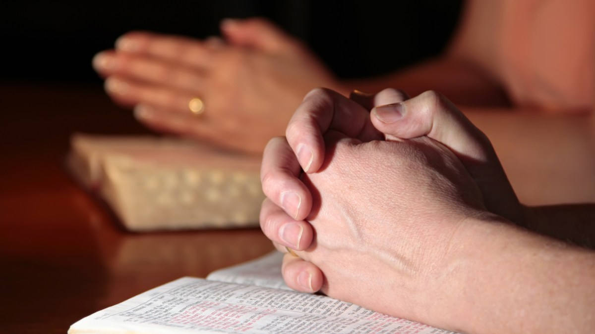 COUPLE PRAYING