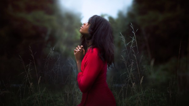 PRAYING WOMAN