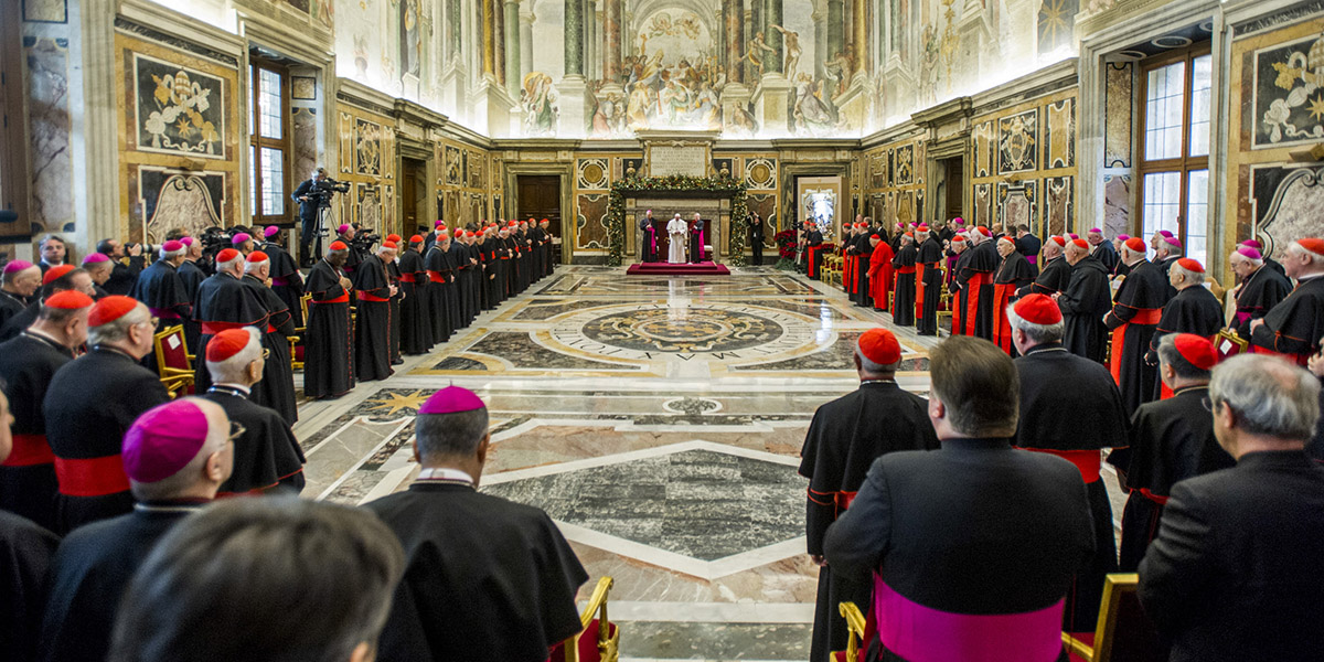 POPE FRANCIS GREETS THE ROMAN CURIA