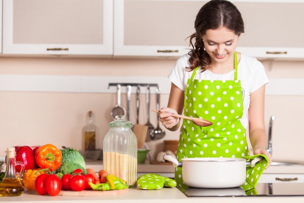 young woman cooking in the kitchen