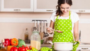 young woman cooking in the kitchen