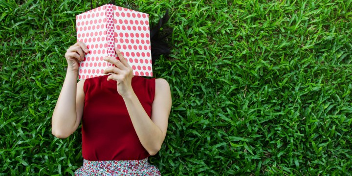 WOMAN, BOOK, GRASS