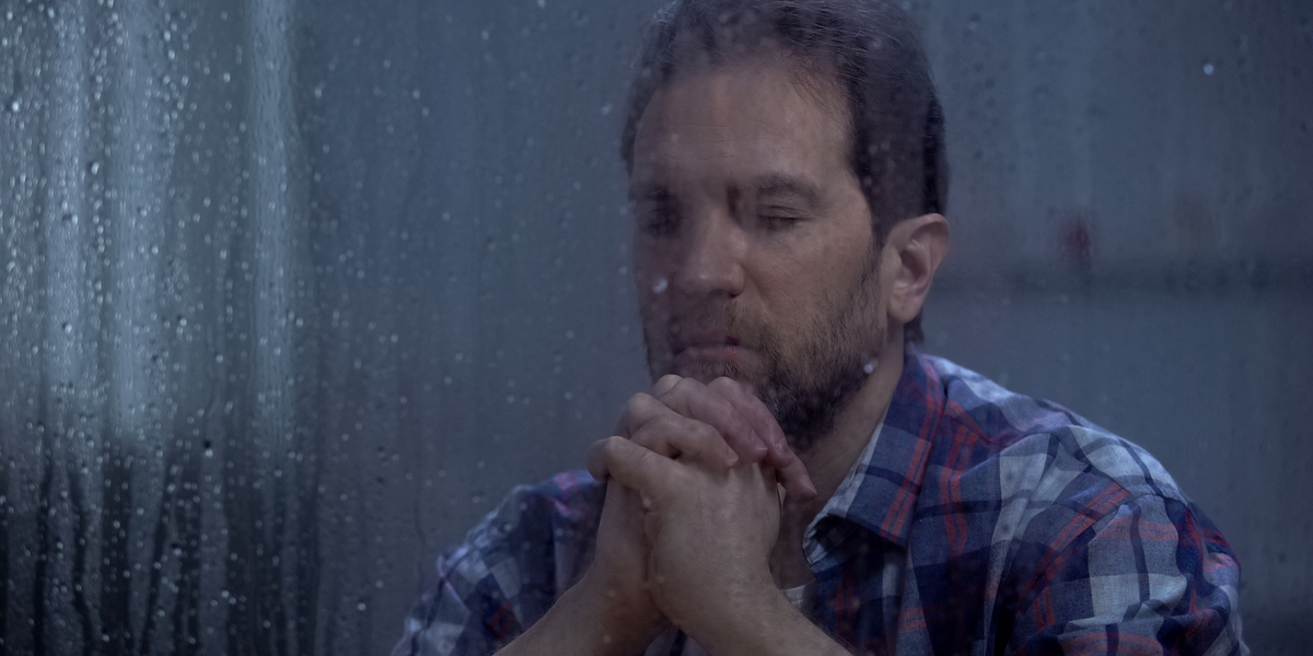 adult man praying