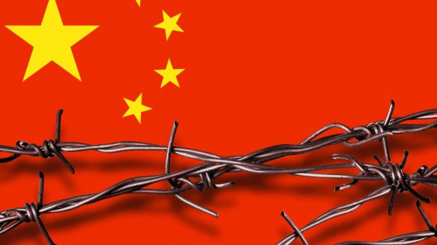 CHINA'S FLAG WITH BARBED WIRE