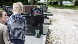 web2_mother-and-son-visiting-grave-of-deceased-family-_shutterstock_647459776-scaled-2560.jpg