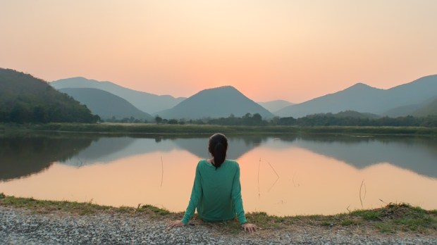 web3-woman-sitting-serene-contemplation-nature-tananyaa-pithi-shutterstock.jpg