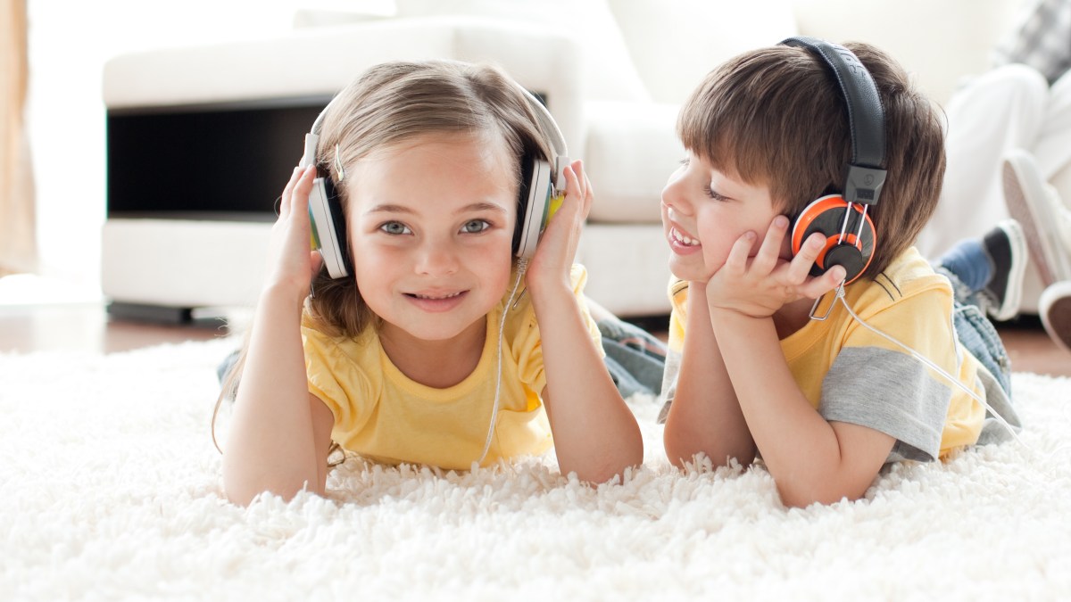 children listening music