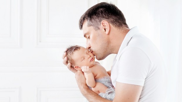 WEB3-MAN-BABY-NEWBORN-LOVE-FATHER-KISS-SHUTTERSTOCK.jpg