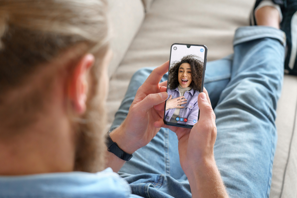 Young man; girlfriend; video call