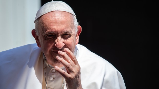 Pope Francis blesses faithful as he leaves St. Peter's square on the Popemobile