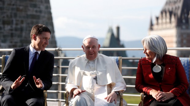Canadian Prime Minister Justin Trudeau, Pope Francis, and Governor General of Canada Mary Simon sit for a photo at the Citadelle de Québec in Quebec City, Quebec