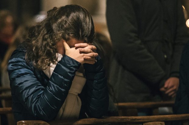 PRAY-WOMAN-CHURCH-ciric_336649-e1668441727484