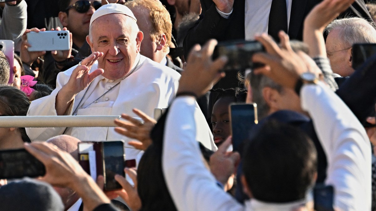 Pope-Francis-waves-as-he-arrives-for-the-weekly-general-audience-AFP