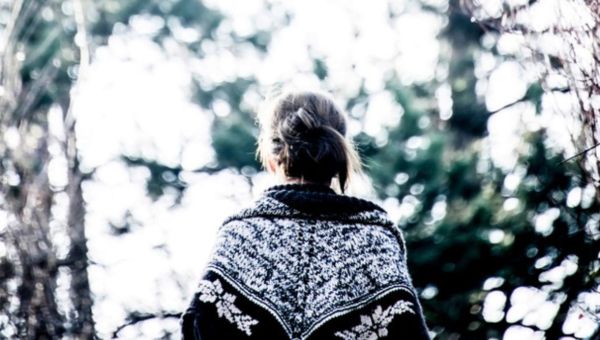 woman walking forest