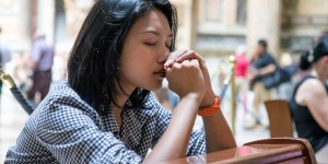 A woman praying in church