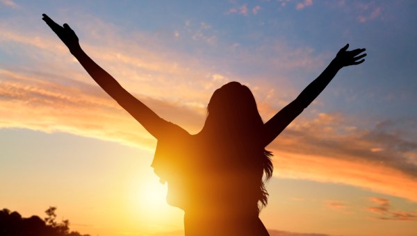 woman with raising hands