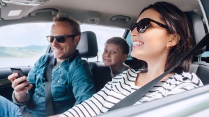 family riding in car