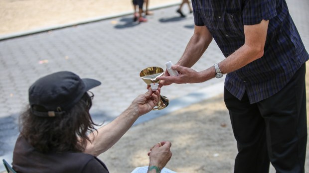 MASS-OUTDOOR-PRIEST-shutterstock_307733915.jpg