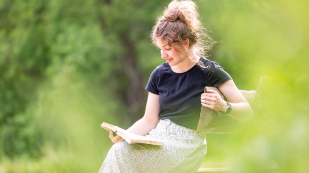 woman-bible-park-reading-shutterstock