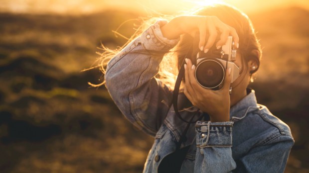 Woman take a picture Shutterstock