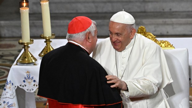 Pope Francis greets Marseille's Archbishop and Cardinal Jean-Marc Aveline