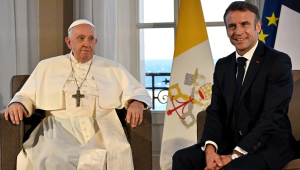 Pope Francis (L) meets with French President Emmanuel Macron at the Palais du Pharo in the southern port city of Marseille